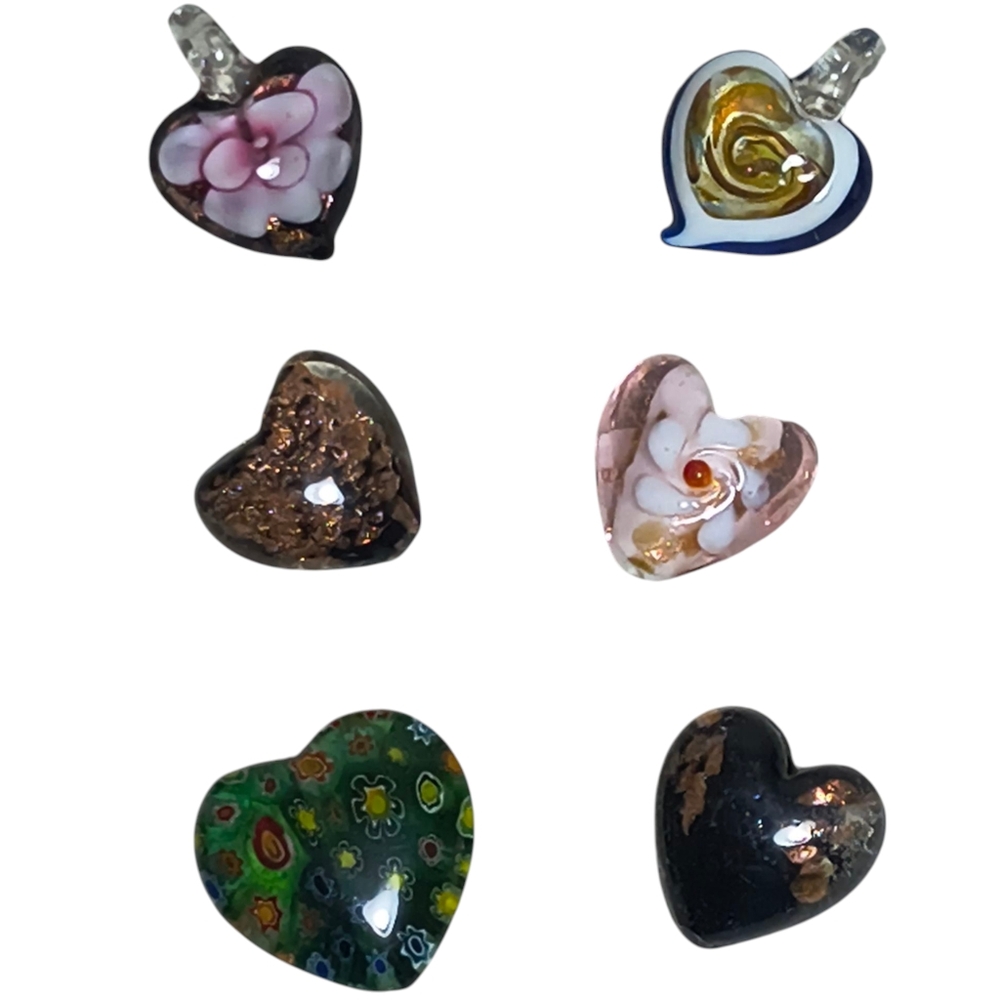 Art glass heart-shaped pendants and beads.